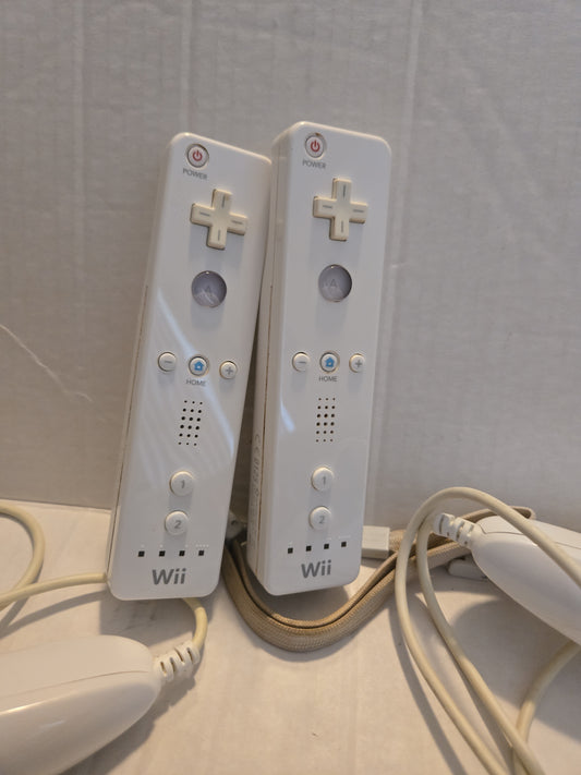 Pair Of Nintendo Wii Remotes With Nunchucks