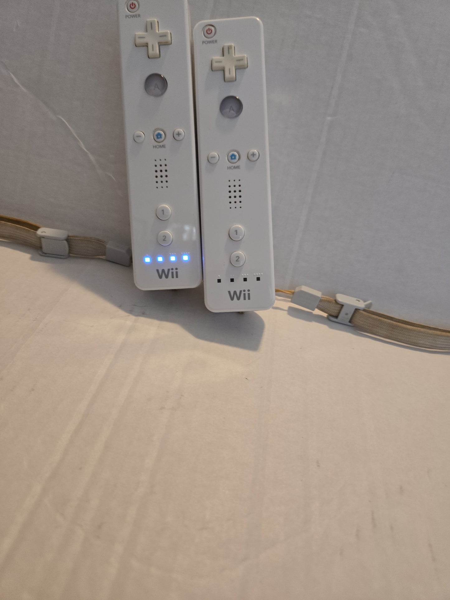 Pair Of Nintendo Wii Remotes With Nunchucks