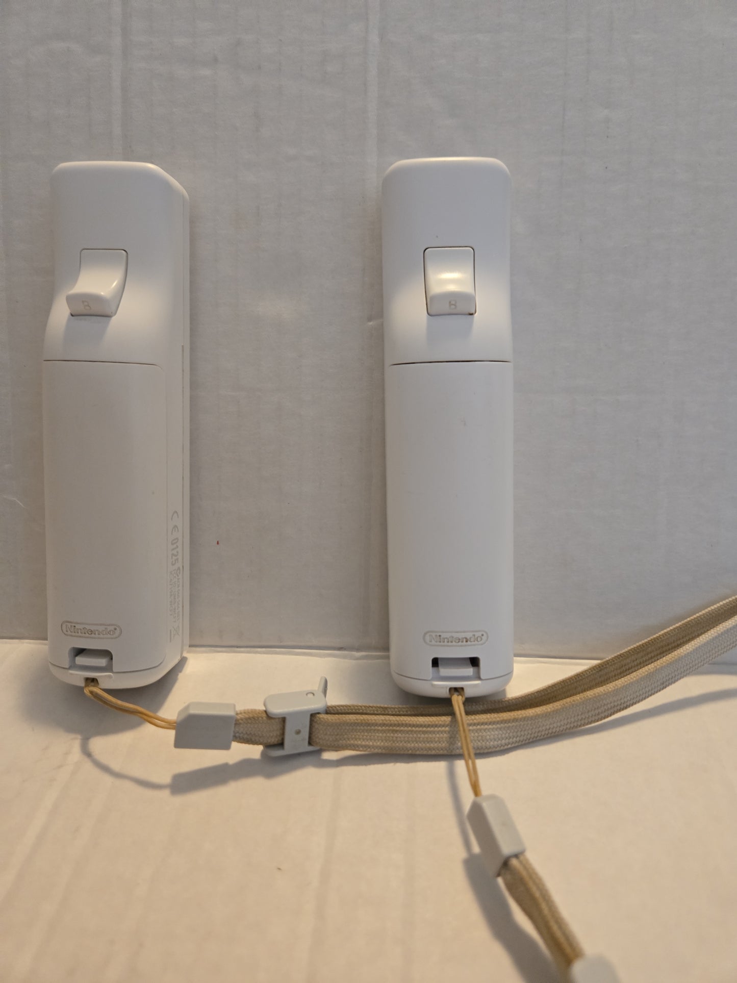 Pair Of Nintendo Wii Remotes With Nunchucks