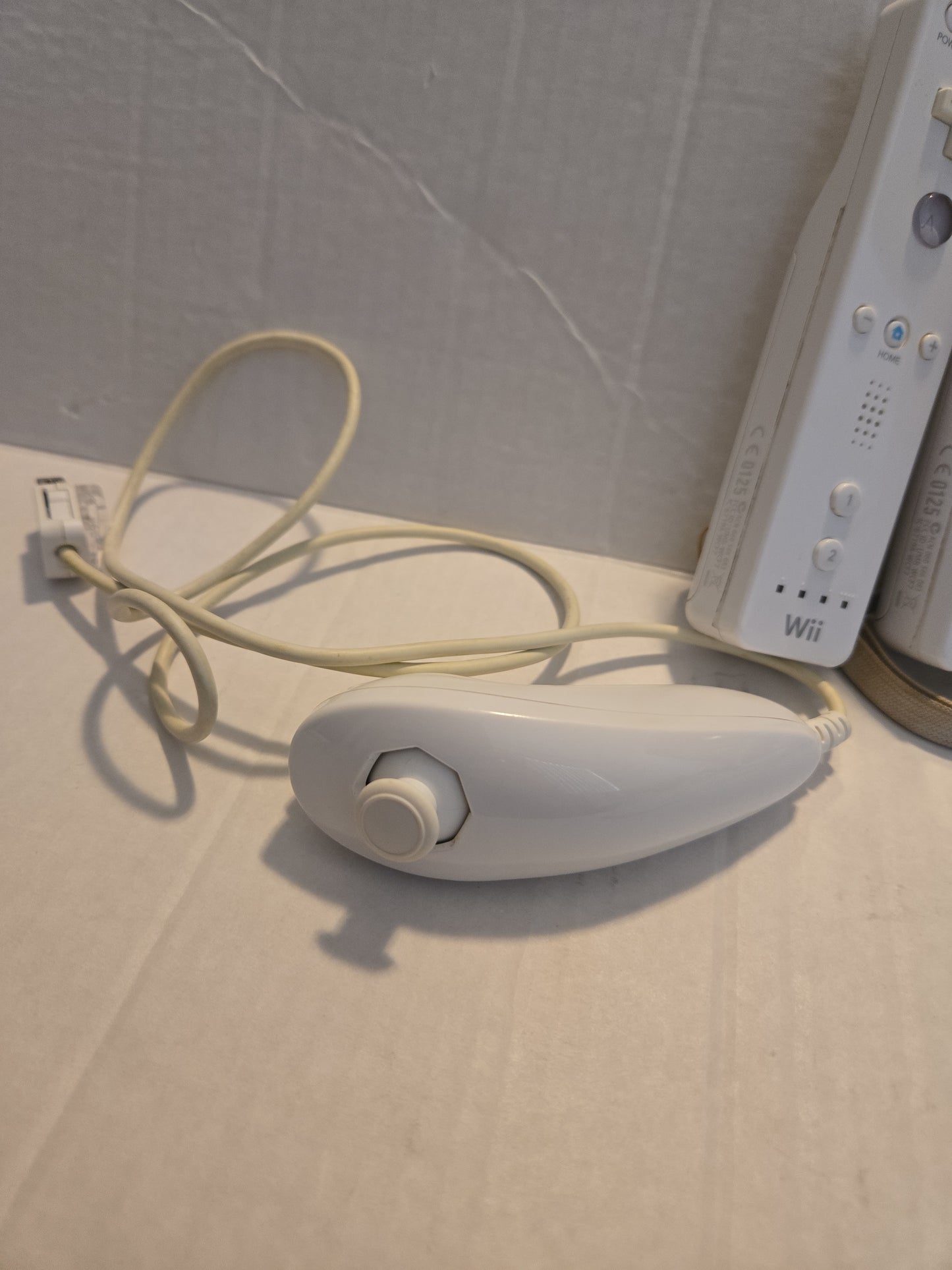 Pair Of Nintendo Wii Remotes With Nunchucks